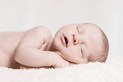 The Sleep Advice That I Could’ve Done Without Newborn Baby Male Sleeping Peacefully Closeup Face
